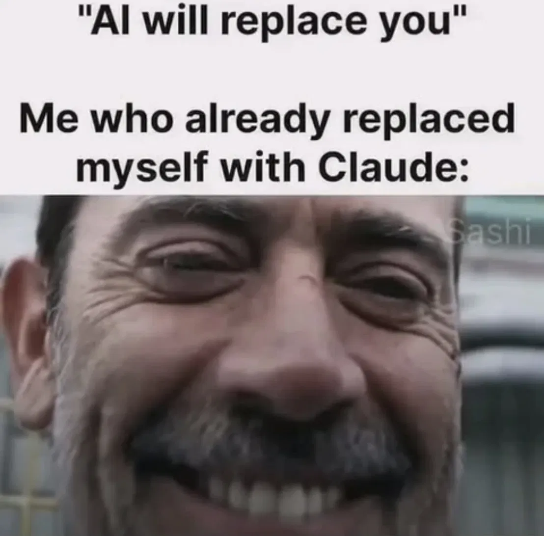 A close-up of a smiling man squinting at the camera. The text above reads: "AI will replace you." Below that: "Me who already replaced myself with Claude:"